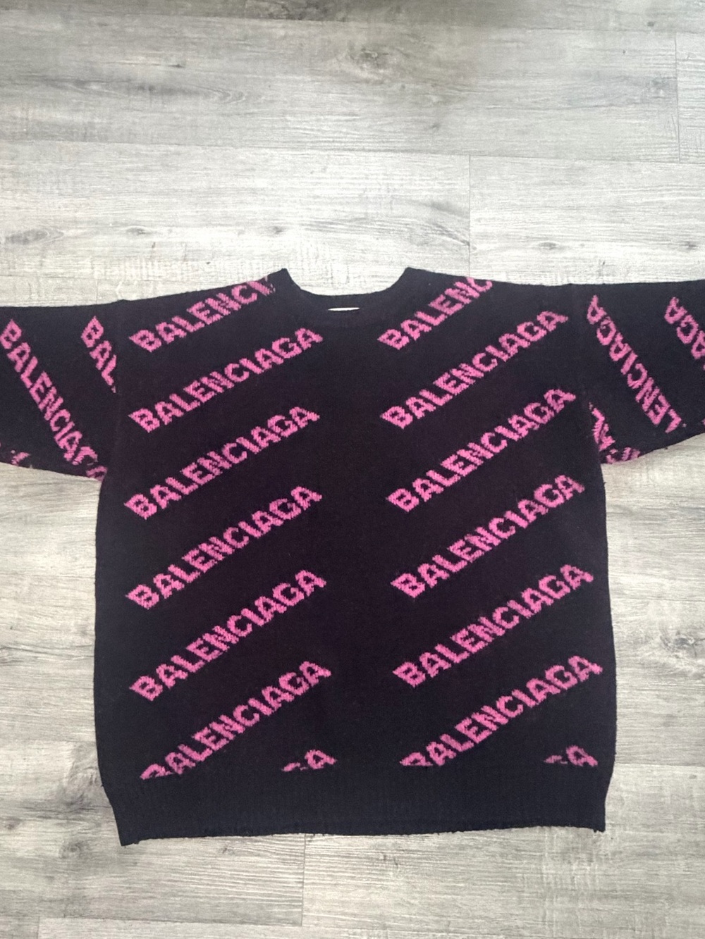 Balenciaga Black Crewneck Sweater with Pink All-Over Logo